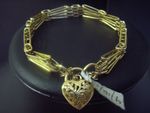 Bracelet Bow Tie Gate with filligree heart 9 Carat G-D 9/18/6